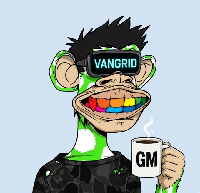 An illustration of a green cartoon monkey wearing a black shirt, sporting rainbow-colored teeth, a black 'VANGRID' VR headset, and holding a white mug that says 'GM'.