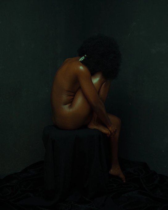 The caption for this image could read: "A moment of solitude captured in a hauntingly beautiful composition. The artwork visually encapsulates the poignant sentiment of the accompanying text—conveying the inner turmoil and the façade of happiness one often maintains amidst emotional struggles."