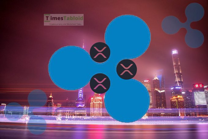 A promotional graphic for "TimesTabloid" features a large blue XRP logo overlaid on a nighttime cityscape skyline with light trails.