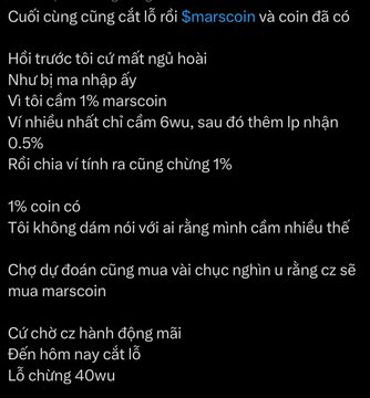 A black screen displays Vietnamese text discussing a loss on '$marscoin' and 'coin', mentioning holding 1% and a loss of '40wu'.