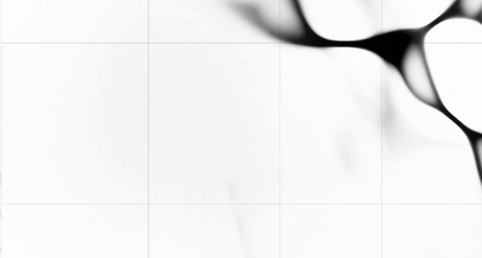 An abstract, blurry image featuring black and white fluid-like shapes, possibly resembling ink in water or smoke.