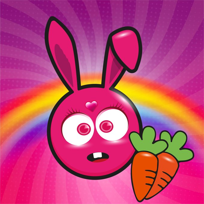 A cheerful pink cartoon bunny with wide eyes and a small heart on its forehead holds two carrots against a vibrant purple sunburst background with a rainbow arching behind it, perfectly matching the upbeat "Gm and a happy new week, my precious humans" greeting with its bright, joyful energy.