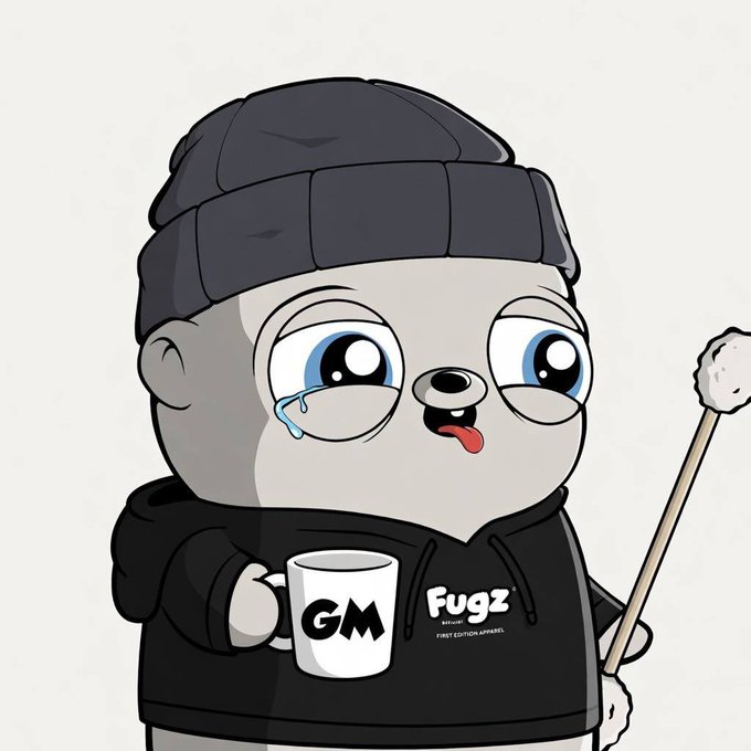 A cartoon character with large blue eyes and a black beanie wears a black hoodie labeled 'Fugz FIRST EDITION APPAREL', holding a 'GM' mug and a stick.