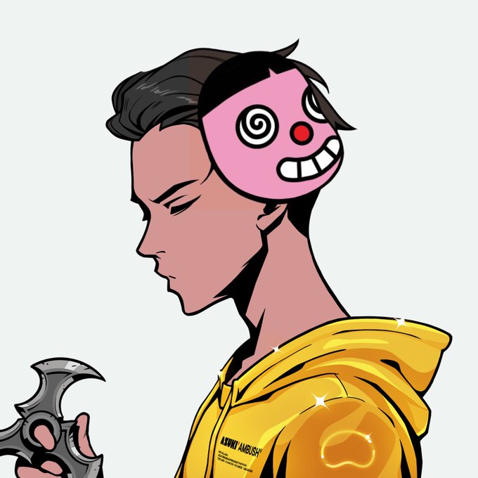 A profile illustration shows a character with half-shaved dark hair, a yellow ANTI AMBUSH hoodie, and a pink cartoonish mask covering the back of their head, while holding a curved weapon. The surreal, intense artwork visually echoes the "Gm, big week ahead" sentiment with its bold, ready-for-action energy.