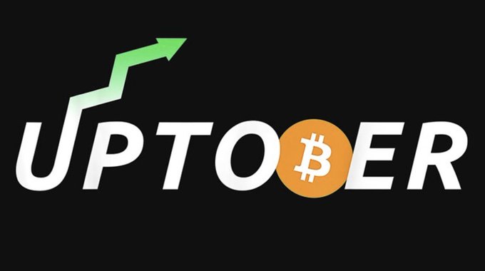 A logo for 'UPTOBER' featuring the Bitcoin symbol (₿) replacing the 'O' in 'UPTOBER' with a green upward trending arrow on a black background.
