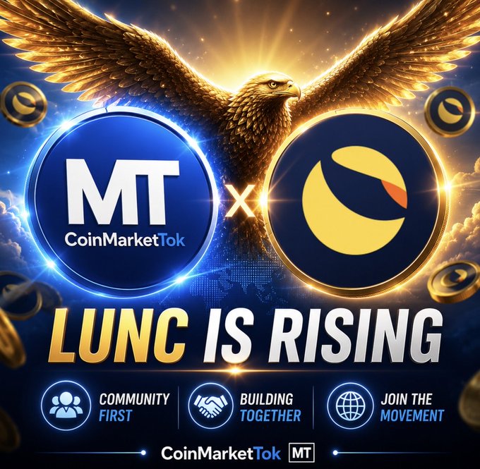 The image features an eagle with its wings spread wide against a blue background, symbolizing power and freedom. Below the eagle, there are two circles representing "MT" and "LUNC IS RISING", indicating that these entities are being compared in terms of their strength or influence within the cryptocurrency world. The text above the eagle reads "MT is rising", suggesting that the cryptocurrency market is experiencing growth. The image also includes a postcard with logos for CoinMarketTok, which is likely promoting the platform and its services to potential users.
