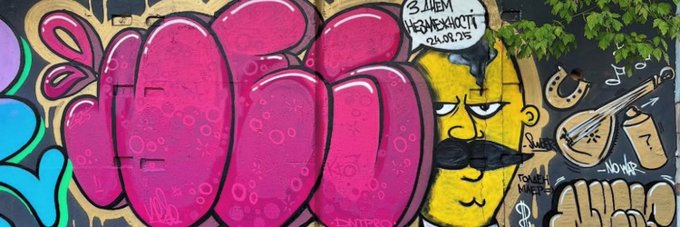 This vibrant graffiti piece features bubble letters and cartoon characters, including one with a mustache and a speech bubble containing text. The artwork is relevant to the giveaway posted, potentially as a visual representation of the artistic or community spirit associated with @NesoArts_NFT.
