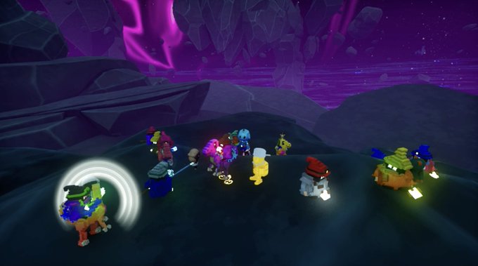 The image features a group of people standing around, with some of them holding flashlights or lanterns. The scene takes place in a dark area, possibly a cave or a mountain top, where they are gathered for an event. There are at least nine people visible in the image, and they appear to be enjoying themselves as they engage in various activities. The post seems to be promoting a gaming event or party, with participants sharing their experiences on social media platforms like Instagram.