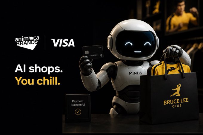 A friendly white robot labeled "MINDS" holds up a Visa card and a "BRUCE LEE CLUB" shopping bag, with a "Payment Successful" confirmation displayed below, alongside the Animoca Brands and Visa logos and the tagline "AI shops. You chill."—visually illustrating the post's claim about Animoca's successful live pilot of an AI agent that can autonomously handle real shopping and payments.