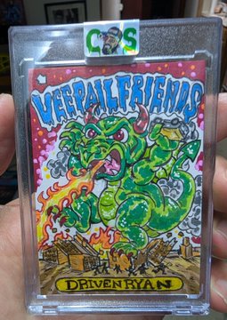 A colorful hand-drawn trading card titled 'METAL FRIENDS' featuring a green monster with horns breathing fire on a city, labeled 'DRIVEN BY ZAN' at the bottom, held in a protective sleeve marked 'CRPS'.