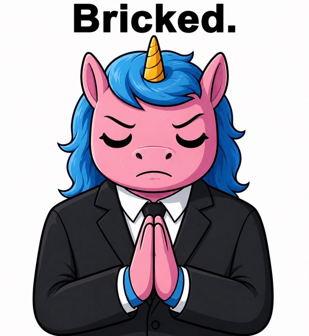 A cartoon pink unicorn with blue mane wearing a black business suit has its eyes closed and hands pressed together in prayer beneath the bold text 'Bricked.'