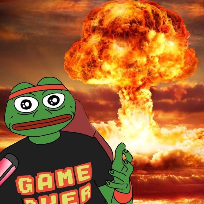 A cartoon Pepe the Frog wearing a red headband and a 'GAMER' shirt makes an 'OK' hand gesture in front of a large nuclear mushroom cloud explosion.