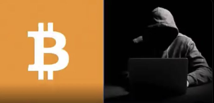 A split image showing the Bitcoin logo on an orange background on the left, and a hooded figure using a laptop in darkness on the right, suggesting cryptocurrency-related cybercrime.