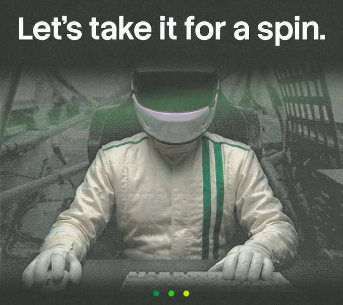 A person wearing a white and green helmet and a matching jacket sits at a computer keyboard in a dimly lit setting; the text 'Let's take it for a spin.' appears at the top.
