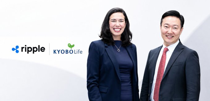 The image features two professionally dressed individuals alongside the Ripple and Kyobo Life logos, likely depicting executives from both companies involved in their partnership. This visual relates to the announcement of their joint blockchain-based initiative to settle tokenized South Korean government bonds, marking a potential first in the country's financial sector.