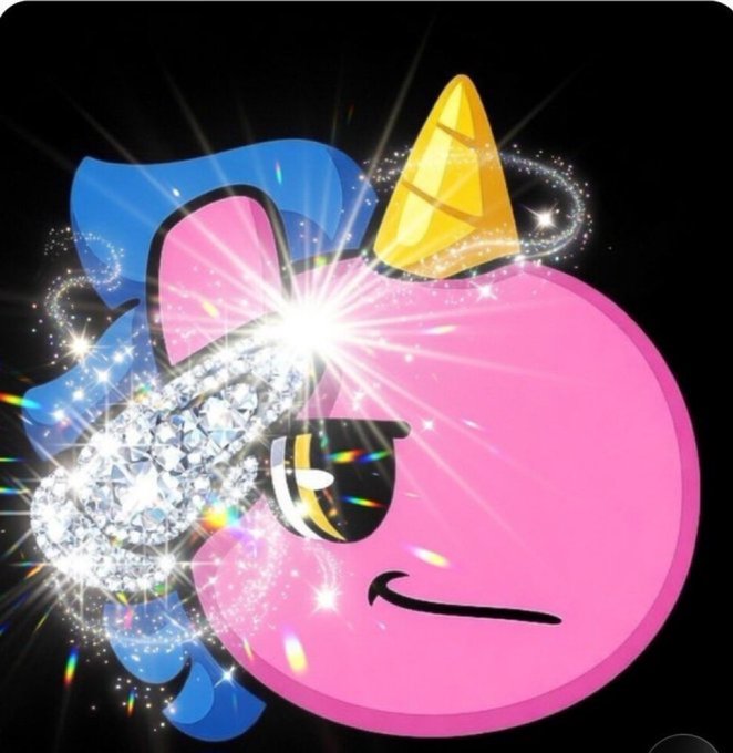Sparkly digital artwork featuring a pink unicorn emoji with a rainbow mane and a golden horn, decorated with diamonds and light rays.