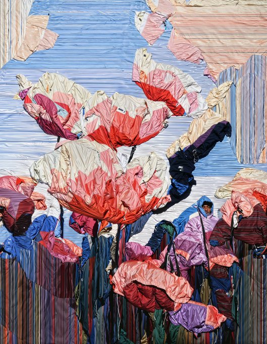 An abstract or AI-generated artwork showing large pink, white, and red floral shapes rendered with a textured, painterly brushstroke effect against a blue and black background.