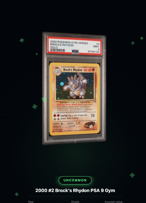 Digital display of a PSA 9 graded 2000 #2 Brock's Rhydon Pokemon card from the Gym Heroes set, marked as Uncommon.
