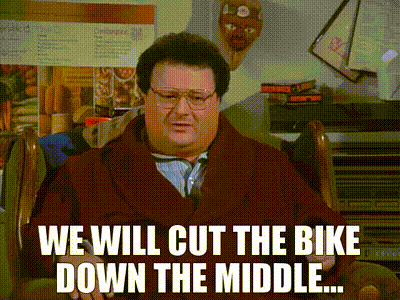 A meme image featuring actor Wayne Knight as Newman from Seinfeld, wearing a red cardigan, with white text overlay reading 'WE WILL CUT THE BIKE DOWN THE MIDDLE...'