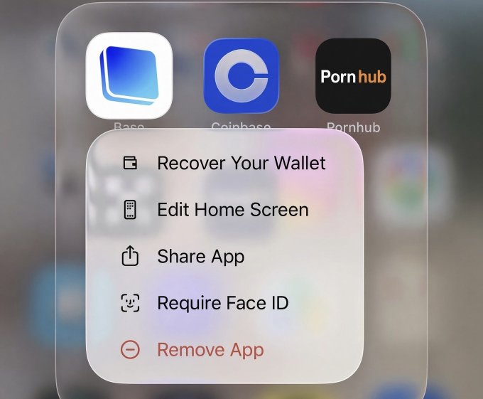 A close-up of an iOS app context menu showing options to Recover Your Wallet, Edit Home Screen, Share App, Require Face ID, and Remove App, with Coinbase and Pornhub app icons visible.