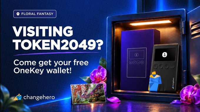 A promotional banner for 'Token2049' by 'ChangeHero' offering a free OneKey wallet at their 'Floral Fantasy' booth, showing a safe containing the wallet and a card.