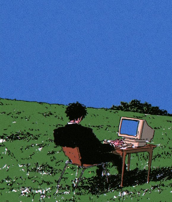 An illustration shows a person in a suit sitting at a desk with a vintage computer in a green field under a clear blue sky.