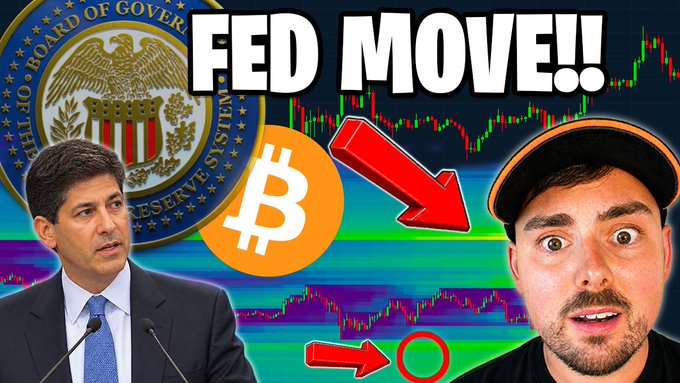 A YouTube thumbnail titled 'FED MOVE!!' showing a Federal Reserve official, a Bitcoin logo with a downward red arrow, and a man with a surprised expression over stock charts.