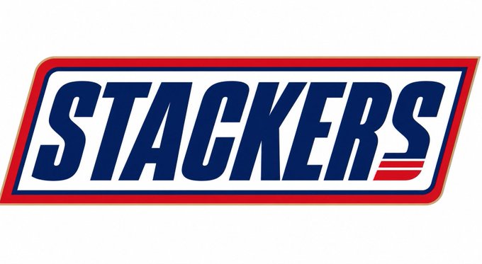 A logo featuring the word 'STACKERS' in bold blue letters set against a white background with a red and blue border, including small red stripes at the end.