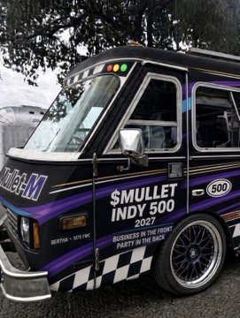 A purple, black, and white Mullet van features 'MULLFAM' branding and text reading '$MULLET INDY 500 2027 — BUSINESS IN THE FRONT, PARTY IN THE BACK'.