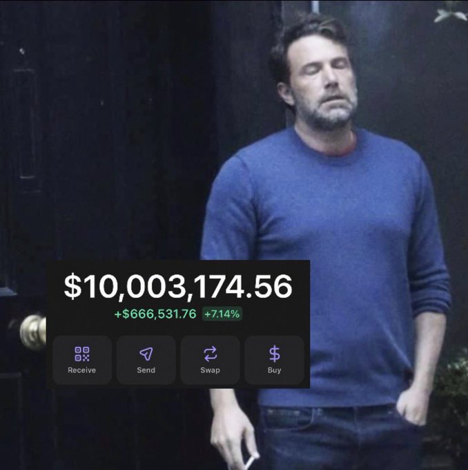 A man in a blue sweater stands in front of a dark door with a superimposed image of a cryptocurrency wallet interface showing a balance of '$10,003,174.56' with a '7.14%' increase and buttons for 'Receive', 'Send', 'Swap', and 'Buy'.