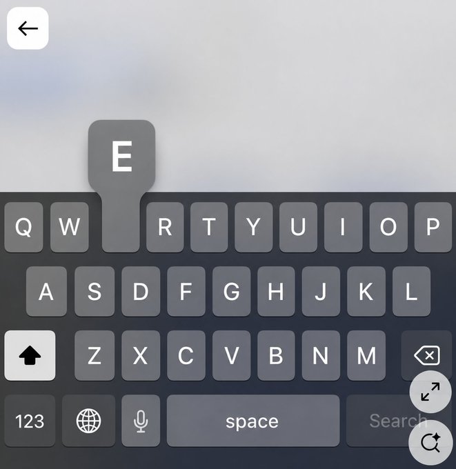 An on-screen mobile keyboard is shown with the letter "E" enlarged as a popup preview above the key. The image relates to the post's clue about an air-gapped cold wallet beginning with "E," prompting viewers to think of options like **Ellipal**, **Exodus**, or **Electrum**.