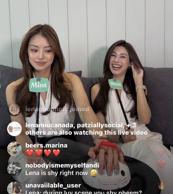 A live video stream featuring two women with microphones labeled 'Mint', showing chat messages from viewers commenting about 'Lena' being shy.