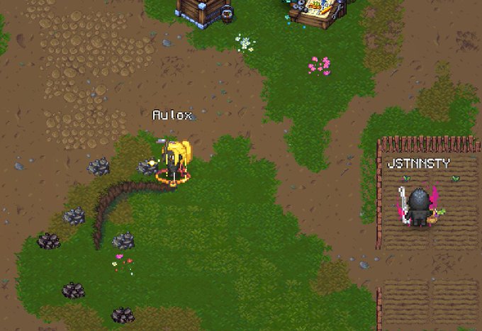 A pixel art video game scene showing two characters labeled 'Autox' and 'JSTNNSTY' in a grassy area with dirt patches, rocks, flowers, and wooden structures.
