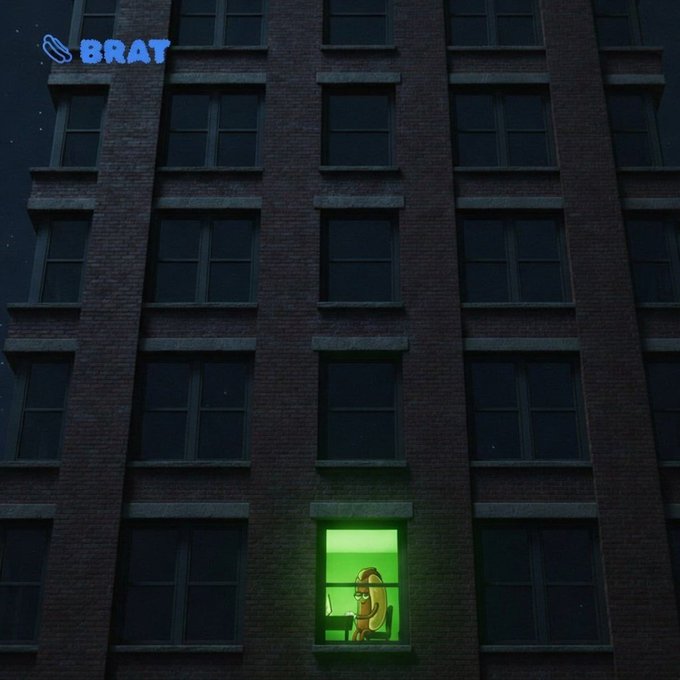 A tall apartment building at night with most windows dark except for one lit window showing a green pixelated character; "BRAT" appears in blue text in the upper left.