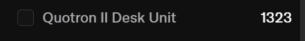 Black screen with text reading 'Quotron II Desk Unit' next to the number '1323'.