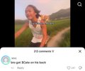 A social media post from user 'vini' featuring a video still of a smiling child outdoors, with the caption 'How gurl! When u on his track?' and 315 comments.