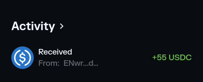 A dark-themed activity log showing a received transaction of "+55 USDC" from "ENwr...d..." The image illustrates modest earnings from a web3 gig, matching the caption's "not much but honest work" sentiment by highlighting a small but noteworthy crypto payment.
