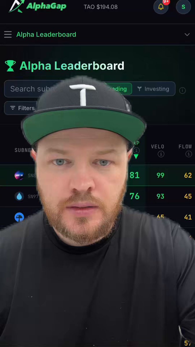 The image shows a man wearing a black t-shirt with a green baseball cap, looking at the camera while holding a phone displaying an Alpha Leaderboard for Bitcoin. The caption reads "Bitcoin feels like the past now. Bittensor feels like the next wave most people are about to miss." This suggests that Bitcoin is becoming increasingly obsolete and losing its status as the dominant cryptocurrency in the market. The post also mentions Bitcoin's role in creating a decentralized market, mining, and validators judging the work, which further supports the idea of Bitcoin's decline in popularity compared to other cryptocurrencies like Bittor.