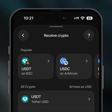 A smartphone screen displaying a crypto wallet app's 'Receive crypto' page, showing options for USDT on BSC and USDC on Arbitrum.