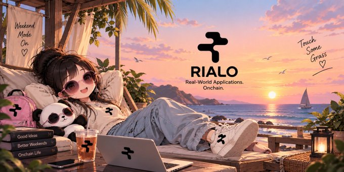An anime-style illustration of a girl with sunglasses lounging on a beach at sunset, featuring the 'RIALO' logo with the tagline 'Real-World Applications. Onchain.'