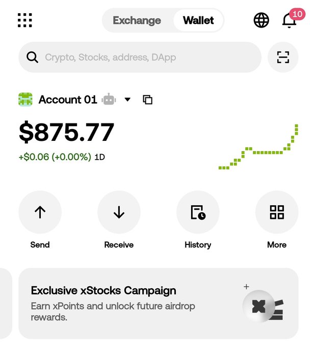 A cryptocurrency wallet app screen displaying 'Wallet' tab with Account 01 showing a balance of $875.77, up $0.06 (+0.00%) over 1D, with options for Send, Receive, History, and More, and a campaign banner for 'Exclusive xStocks Campaign'.