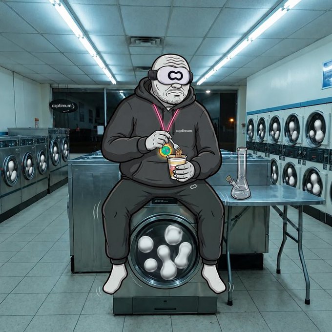 A cartoon-style illustration depicts a character wearing goggles and a "copitnum" hoodie sitting on a washing machine in a laundromat, eating from a cup with a bong on the table beside him.