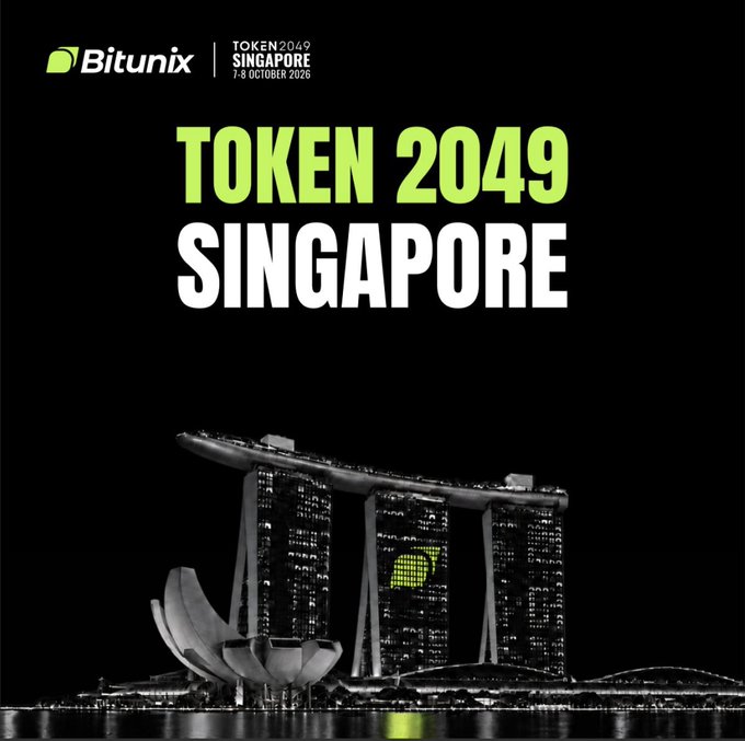 A promotional graphic for 'TOKEN 2049 SINGAPORE' featuring the dates '7-8 OCTOBER 2026', a Bitunix logo, and an image of Singapore's Marina Bay Sands hotel in black and white with the Bitunix logo highlighted in green.