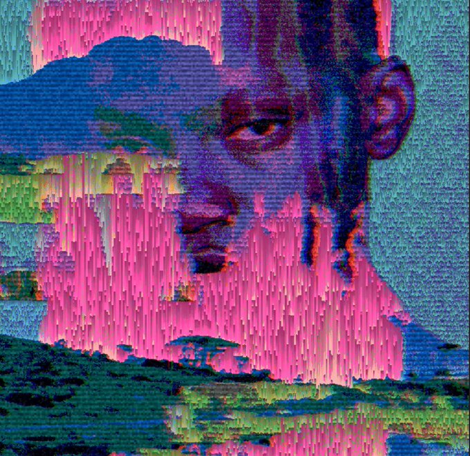 A glitch art style image featuring a distorted, pixelated portrait of a man's face in vibrant blue, pink, and green colors with vertical streaking effects.