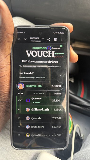A hand holds a smartphone displaying the "commons" website promoting a "VOUCH" airdrop, showing a leaderboard with @Slayed_eth topping the ranks at 1.186K points, followed by @axwole (29,200), @Sloyed_eth (1.191K), @zocxbt (762,542), @ox_ultra (513,454), and @Carlitoswa_y (414,502). The image visually reinforces the "vouch for vouch?" caption by showcasing the airdrop's ranking system where users accumulate vouch points.