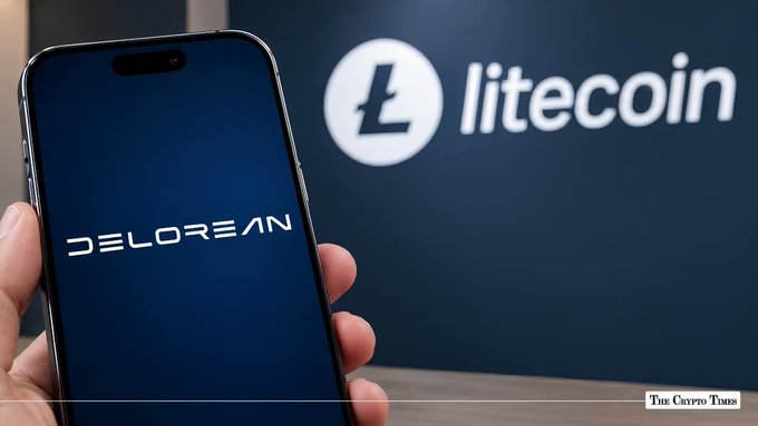 A hand holding a smartphone displaying the 'DELOREAN' logo, with the Litecoin (L) logo and branding in the background, credited to The Crypto Times.