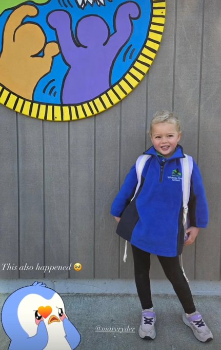 A photo of a young smiling girl wearing a blue school uniform and a backpack, standing in front of a colorful mural with a 'Pororo' cartoon character overlay and text reading 'This also happened 😳 @marvryder'.