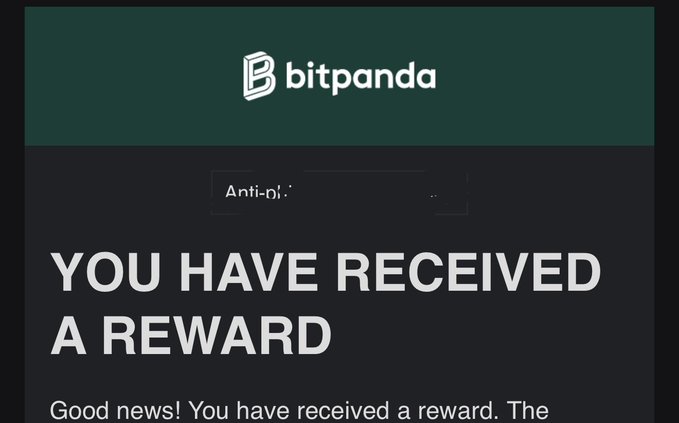 A Bitpanda promotional banner displays the text "YOU HAVE RECEIVED A REWARD" along with a blurred code field reading "Anti-pi..." and the Bitpanda logo at the top.