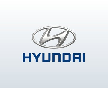 The Hyundai logo featuring the silver stylized 'H' emblem in an oval with the blue 'HYUNDAI' text below it on a light gradient background.
