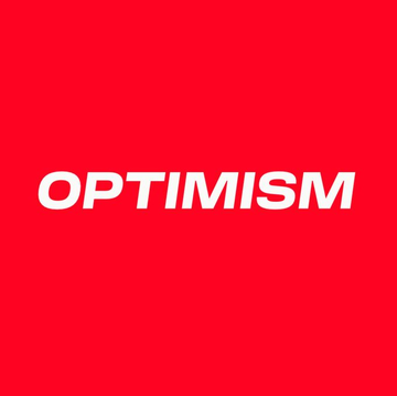 The image displays the word "OPTIMISM" in white text against a red background, directly referencing the blockchain platform Toss is partnering with for their new stablecoin pilot. This visual emphasizes the "Optimism" component of the news.